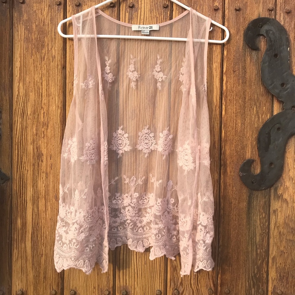 Pink lace vest.